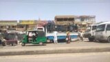 FILE: People load their belonging on a truck in Khartoum, Sudan, Tuesday, May 23, 2023. The U.N. migration agency IOM said Wednesday that the fighting between Sudan's military and a powerful paramilitary force had displaced more than a million people. 