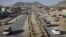 Vehicles cross on newly- constructed Darul Aman street in Kabul, Afghanistan, April 21, 2011