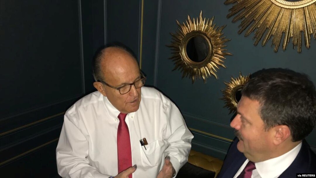 Ukrainian lawmaker Andriy Derkach attends a meeting with U.S. President Donald Trump's personal lawyer Rudolph Giuliani in Kyiv, in this undated picture obtained from social media. (Courtesy of Andriy Derkach)