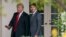 El presidente Donald Trump y el primer ministro canadiense, Justin Trudeau, caminan conversando en los pasillos exteriores de la Casa Blanca el miércoles 11 de octubre.