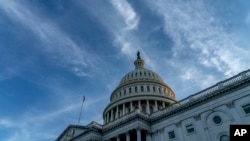 FILE - The U.S. Capitol building is seen as the sun sets on Capitol Hill in Washington, June 21, 2022. 