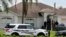 Police stand in front of one of the houses that officials indicated was connected to the Orlando shooter in Port St. Lucie, Florida, U.S. June 12, 2016. 