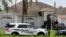 Police stand in front of one of the houses that officials indicated was connected to the Orlando shooter in Port St. Lucie, Florida, U.S. June 12, 2016. 