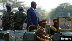 FILE - Burundi's President Pierre Nkurunziza arrives for the celebrations to mark Burundi's 55th anniversary of independence at the Prince Louis Rwagasore stadium in Bujumbura, Burundi, July 1, 2017.