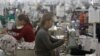 Employees work at a factory supplier of the H&M brand in Kandal province, Cambodia, December 12, 2018.