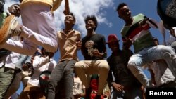 FILE - Youths dance during an Oromo Liberation Front (OLF) rally in the town of Woliso, Oromia region, Ethiopia, Oct. 21, 2018. 