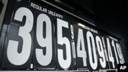 Gasoline prices are displayed on a pump at a filling station on the Palisades Interstate Parkway in Orangeburg, New York, March 7, 2011