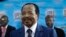 FILE - Cameroonian President Paul Biya makes an appearance during elections in Yaounde, Cameroon, on Oct. 7, 2018. A government spokesperson says Biya will announce whether he will run again in 2025 shortly before that election.