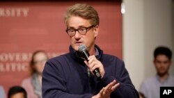 FILE - MSNBC television anchor Joe Scarborough, co-host of the show "Morning Joe," takes questions at a Harvard University student forum, in Cambridge, Massachusetts, Oct. 11, 2017. 