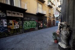 A view of an empty street on the second day of an unprecedented lockdown across all of the country, imposed to slow the outbreak of coronavirus, in Naples, Italy, March 11, 2020.