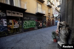 A view of an empty street on the second day of an unprecedented lockdown across all of the country, imposed to slow the outbreak of coronavirus, in Naples, Italy, March 11, 2020.