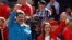 FILE - Venezuela's President Nicolas Maduro and his wife, Cilia Flores, greet supporters at a rally marking the 60th anniversary of the end of dictator Marcos Perez Jimenez's regime, in Caracas, Jan. 23, 2018.