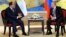 FILE - Russian President Vladimir Putin, right, and Egyptian President Abdel Fattah el-Sissi hold a bilateral meeting on the sidelines of a BRICS Summit in Xiamen, China, Sept. 4, 2017.