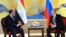 Russian President Vladimir Putin, right, and Egyptian President Abdel-Fattah el-Sissi hold a bilateral meeting on the sidelines of the BRICS Summit in Xiamen, Fujian province, China, Monday, Sept. 4, 2017.