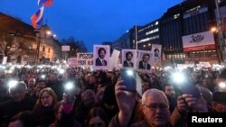 Demonstrators attend a protest called "Let's stand for decency in Slovakia" in reaction to the murder of Slovak investigative reporter Jan Kuciak and his fiancee, Martina Kusnirova, in Bratislava, Slovakia, March 9, 2018.