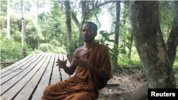 Khoeum Saray, a Buddhist monk who helps manage Monk's Community Forest, which is managed by Buddhist monks and villagers in Anlong Veng in Oddar Meanchey province in northwest Cambodia. May 29, 2019. (Thomson Reuters Foundation/Rina Chandran)