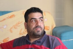 Syrian refugee Mohammed, 45, says he's been unable to sleep since the pandemic began because he's worried about money, in Istanbul, May 20, 2020. (VOA/Heather Murdock)