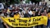 FILE - This June 17, 2012, photo shows Rev. Al Sharpton, center, with demonstrators during a silent march to end the "stop-and-frisk" program in New York.