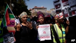 South African women take part in a protest against gender-based violence in Pretoria, South Africa, Sept. 27, 2019.