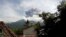 Volcanic material from the eruption of Mount Barujari is seen from Bayan, Lombok Island, Indonesia, Sept. 27, 2016.