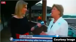 Reporter Alison Parker, left, conducting live interview moments before she was shot dead, Aug. 26, 2015.
