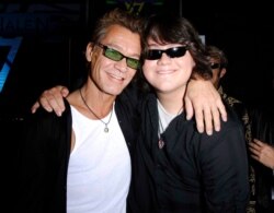 FILE - Eddie Van Halen and Wolfgang Van Halen attend a press conference announcing the dates of "Van Halen's" North American concert tour, Aug. 13, 2007.