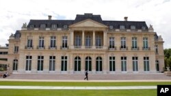 FILE - The Organisation for Economic Co-operation and Development (OECD) headquarters is pictured in Paris, France, June 7, 2017.