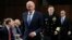 From left, National Intelligence Director Dan Coats, National Security Agency director Adm. Michael Rogers and acting FBI Director Andrew McCabe, arrive for the Senate Intelligence Committee hearing about the Foreign Intelligence Surveillance Act, on Capi