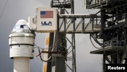 An Atlas V rocket carrying Boeing's CST-100 Starliner capsule is prepared for launch to the International Space Station for a do-over test flight in Cape Canaveral, Florida, Aug. 2, 2021.