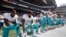 Jelani Jenkins, Arian Foster, Michael Thomas and Kenny Stills kneel during the national anthem, Sept. 11, 2016.