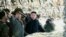 Screen grab shows North Korean leader Kim Jong-Un (C) pointing to a South Korean island during a trip to an artillery unit on Wolnae Island near the disputed maritime frontier with South Korea, Mar. 12, 2012.