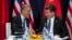 FILE - President Barack Obama (L) shakes hands with Chinese President Xi Jinping during their meeting on the sidelines of the United Nations Climate Change Conference, in Le Bourget, outside Paris, Nov. 30, 2015.