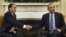 President Barack Obama shake hands with Indonesian President Joko Widodo during their meeting in the Oval Office of the White House in Washington, Oct. 26, 2015.
