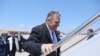Secretary of State Mike Pompeo boards a plane at Andrews Air Force Base, Md., Tuesday, July 30, 2019. 