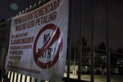 A "No Entry" sign is seen outside Sri Petaling mosque, which has emerged as a source of hundreds of new coronavirus disease infections spanning across Southeast Asia, in Kuala Lumpur, Malaysia, March 17, 2020.