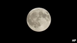 FILE - The moon is shown in Detroit, Michigan. 