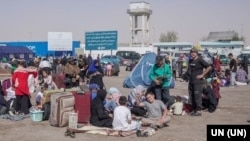 عکس آرشیف از گروهی از مهاجران افغان عودت کننده از ایران به افغانستان