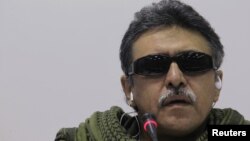 Member of the Revolutionary Armed Forces of Colombia [FARC] rebel group Jesus Santrich talks to the media during a news conference in Havana, January 24, 2013.