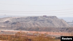 FILE - A copper and cobalt mine run by Sicomines is seen in Kolwezi, Democratic Republic of Congo, May 30, 2015. 