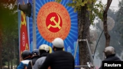 A poster promoting Vietnam's communist party is seen on a street in Hanoi, Vietnam January 23, 2019. Picture Taken January 23, 2019. REUTERS/Kham
