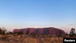 A view of Uluru, formerly known as Ayers Rock near Yulara, Australia, is pictured the day before a permanent ban on climbing the monolith takes effect following a decades-long fight by indigenous people to close the trek, Oct. 25, 2019.