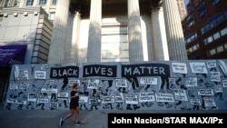 FILE - A Black Lives Matter mural in New York City, June 23, 2020.