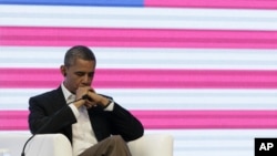 President Barack Obama at the CEO Summit of the Americas in Cartagena, Colombia, Saturday April 14, 2012. (AP Photo/Carolyn Kaster)