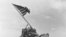 FILE - U.S. Marines raise the American flag atop Mount Suribachi, Iwo Jima, Japan, Feb. 23, 1945. 