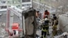 Rescuers search for civilians who were killed when a Russian drone hit an apartment building in Sumy, Ukraine, Jan. 30, 2025. (Ukrainian Emergency Service via AP)