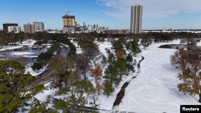 Rare snowstorm blankets Houston and New Orleans