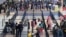 Passengers check-in at the Jorge Chavez International Airport in Callao, Peru, Monday, Oct. 5, 2020. 