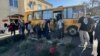 Residents board a bus during evacuation in Tikhoretsk, Krasnodar region, Russia, on Sept. 21, 2024, where Ukraine says it hit a munitions depot with long-range drones overnight. (Anatoly Perepelin on Telegram via Reuters)