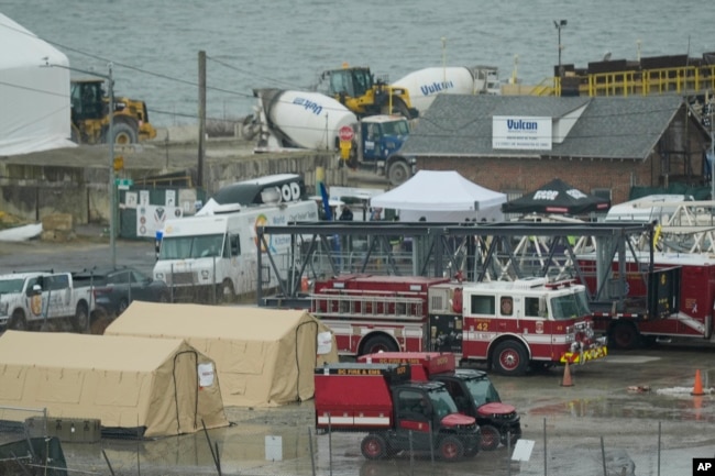 Emergency vehicles and recovery operations are seen near the mouth of the Anacostia River at the Potomac River near Ronald Reagan Washington National Airport, Jan. 31, 2025.