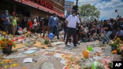 Terrence Floyd, center, at the intersection of 38th Street and Chicago Avenue in Minneapolis, Minnesota, where his brother George Floyd encountered police and died in their custody, June 1, 2020. June 1, 2020.